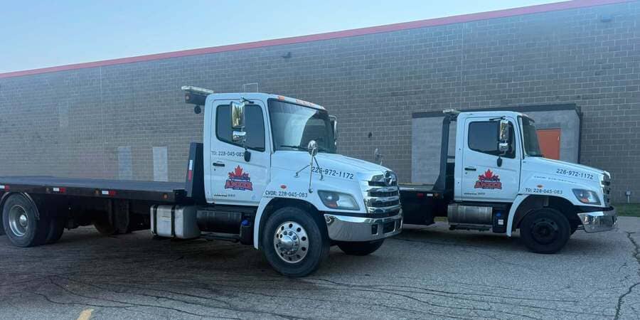 Tow truck driver helping a customer